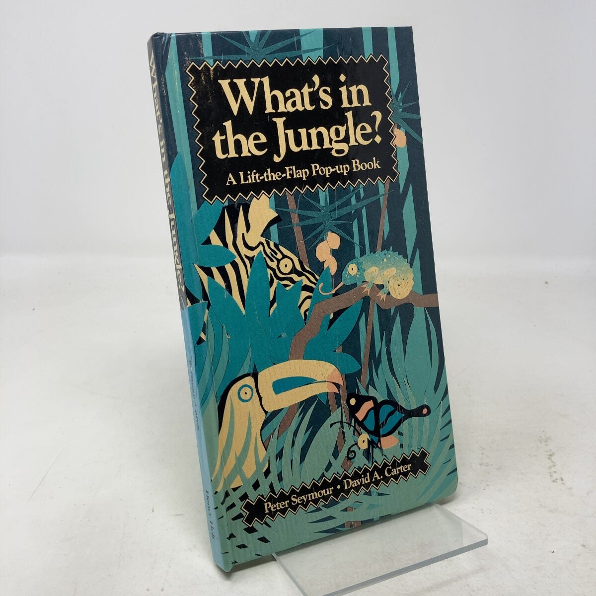 What's in the Jungle? : A Lift the Flap Pop-Up Book | Peter Seymour ...
