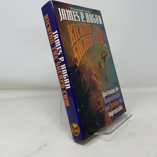 Item #376801 Kicking the Sacred Cow. James P. Hogan