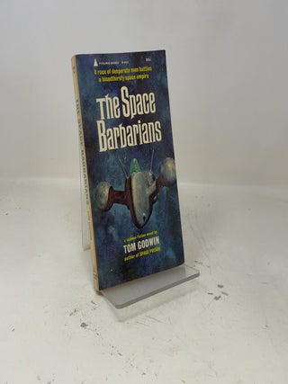 Item #403724 The Space Barbarians. Tom Godwin