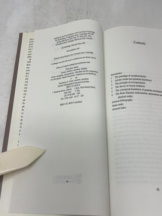 Atoms, Metaphors and Paradoxes : Niels Bohr and the Construction of a New Physics