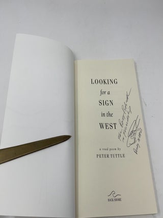 Looking For A Sign In The West: A Road Poem