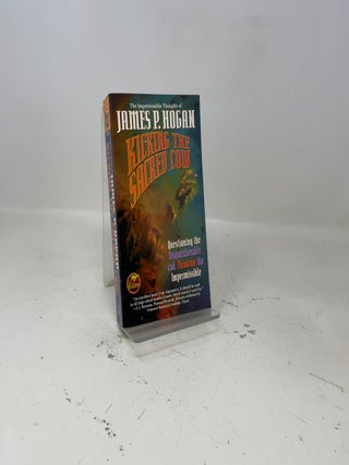 Item #462448 Kicking the Sacred Cow. James P. Hogan
